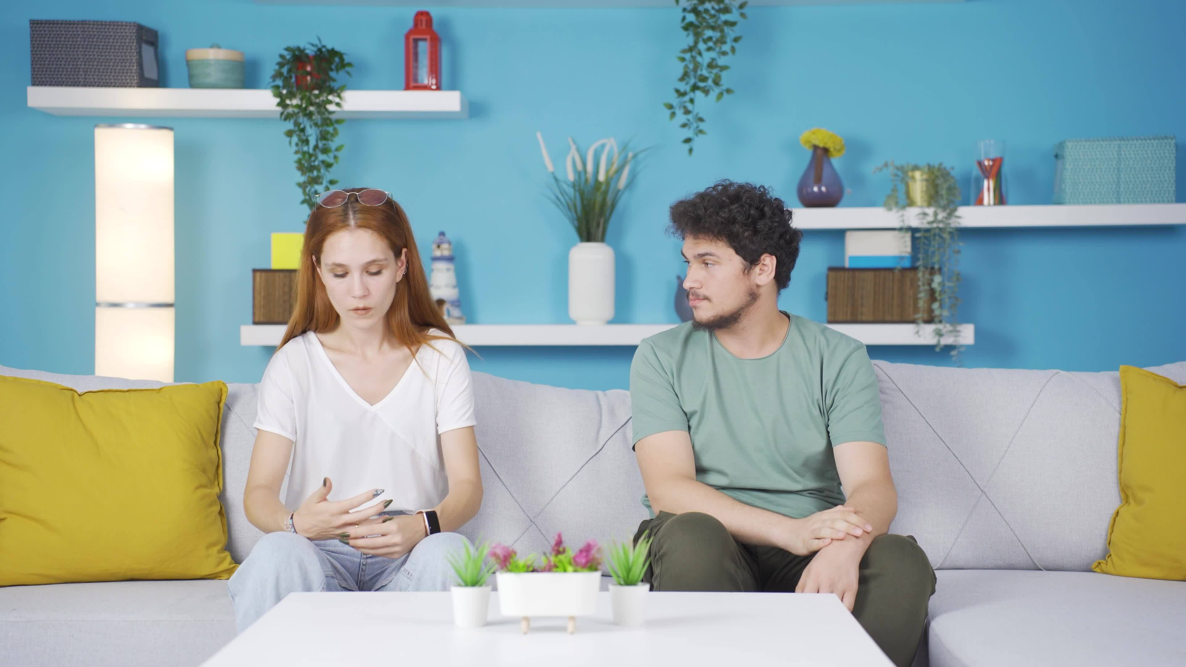 The woman who is angry with her husband throws the ring away. 33027837