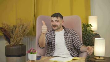 Man giving greeting and applause to camera. video