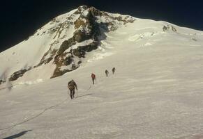 Rope team of climbers photo