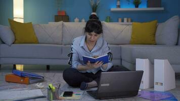 Home office worker woman reading a book. video