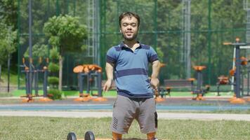 Sportsman dwarf young man giving motivational speech to camera. video