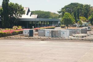 Airplane cargo crates are placed in the airport cargo terminal area photo