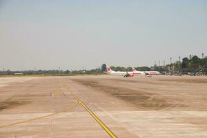 Makassar, Indonesia - September 21th 2023, Several large aircraft from the Indonesian airline and unloaded at Sultan Hasanuddin International Airport, Makassar. photo