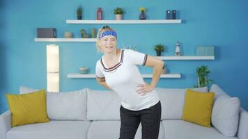 The woman exercising at home. video