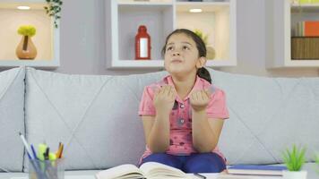 Muslim girl child praying. video