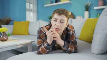 Nervous young man calculating in his head. video