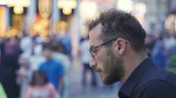 Thoughtful teenager among the crowd. video