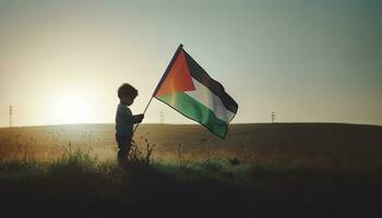 A photo of the boy holding the flag of Palestine on a grassy hill during early morning. AI Generated