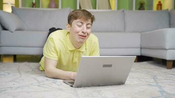 Young man frustrated at home on laptop. video