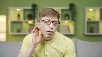 Close-up portrait of listener young man. video