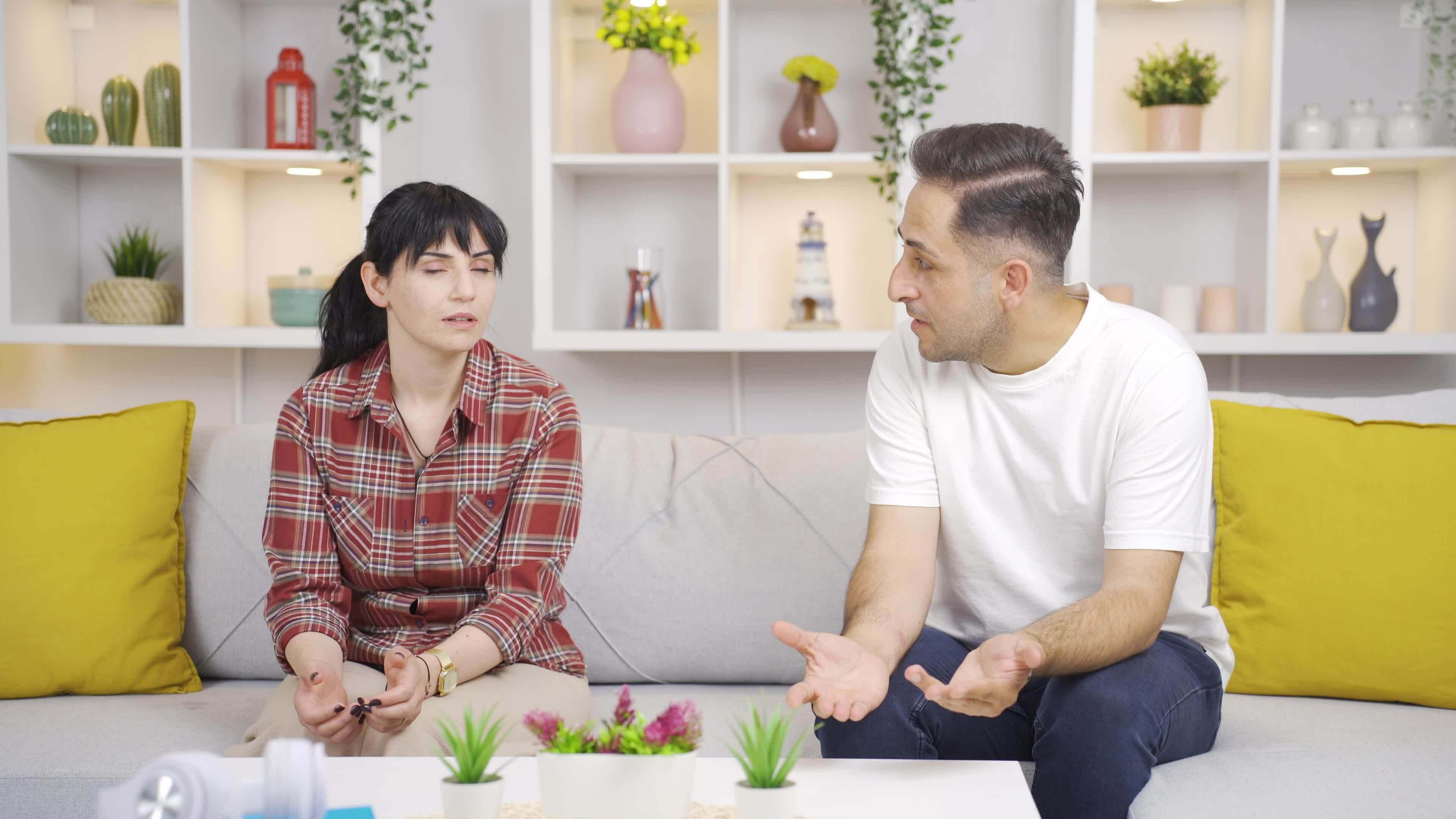 The woman who is angry with her husband throws the ring away. 33030986