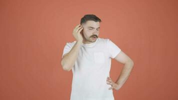 Man with itchy ears. video