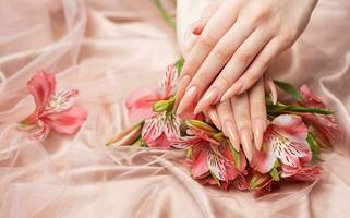 Elegant pastel pink natural manicure. photo