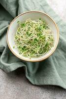 Microgreens grown in a jar. photo