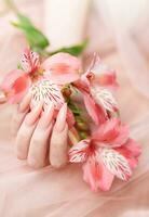 Elegant pastel pink natural manicure. photo