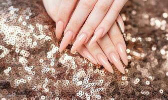 Elegant pastel pink natural manicure. photo