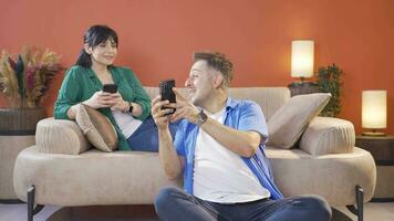 Social media user couple laughing out loud. video