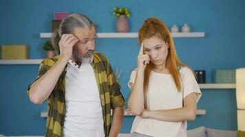 Thoughtful father and daughter. Father and daughter thinking together. video