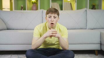 Young man depressed talking to camera. video