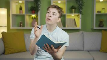 Close-up of young man jotting down his thoughts. video