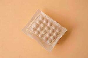 Contraceptive patch safety on pastel background. Generate Ai photo