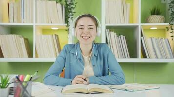 Portrait of happy asian young schoolgirl. video