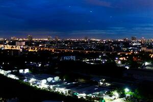 dark blue cloud with white light sky background and city light midnight evening time photo