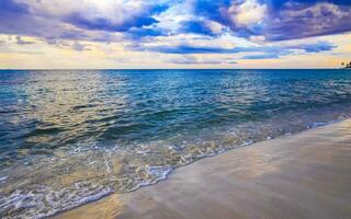 Tropical Caribbean beach clear turquoise water Playa del Carmen Mexico. photo