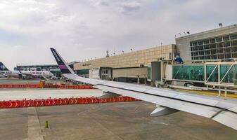 Guadalajara Jalisco Mexico 2023 Guadalajara International Airport aircraft runway indoor building and gate Mexico. photo