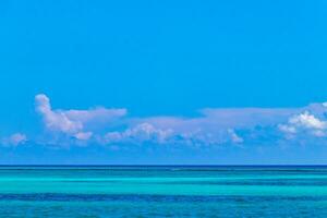 Tropical Caribbean beach clear turquoise water Playa del Carmen Mexico. photo