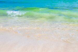 Waves at tropical beach caribbean sea clear turquoise water Mexico. photo