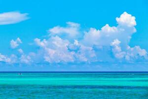 Tropical Caribbean beach clear turquoise water Playa del Carmen Mexico. photo