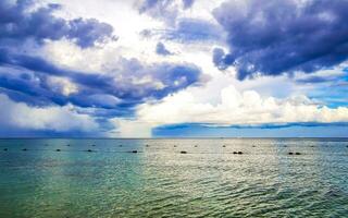 Thunderstorm strong monsoon rain hurricane gloomy clouds Playa del Carmen. photo