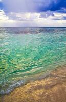 Tropical Caribbean beach clear turquoise water Playa del Carmen Mexico. photo