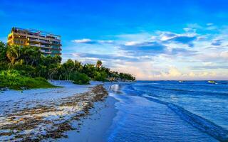 Tropical Caribbean beach clear turquoise water Playa del Carmen Mexico. photo