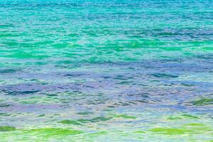 Waves at tropical beach caribbean sea clear turquoise water Mexico. photo