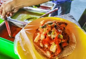 Mexican tacos with lime hot sauce pineapple and onions Mexico. photo