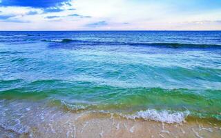 Tropical Caribbean beach clear turquoise water Playa del Carmen Mexico. photo