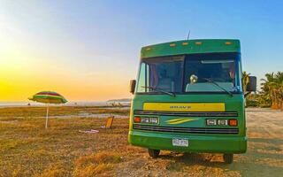 Puerto Escondido Oaxaca Mexico 2023 Camper bus car at sunset in Puerto Escondido Oaxaca Mexico. photo