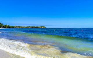 Tropical mexican beach clear turquoise water Playa del Carmen Mexico. photo