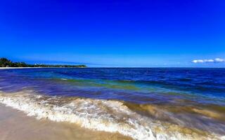 Tropical mexican beach clear turquoise water Playa del Carmen Mexico. photo