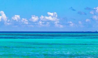 Tropical Caribbean beach clear turquoise water Playa del Carmen Mexico. photo