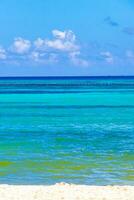 Tropical Caribbean beach clear turquoise water Playa del Carmen Mexico. photo