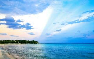 Tropical Caribbean beach clear turquoise water Playa del Carmen Mexico. photo