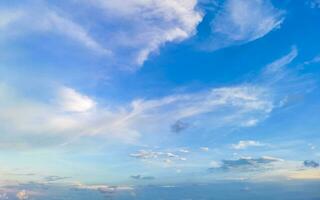 Blue sky with chemical chemtrails cumulus clouds scalar waves sky. photo