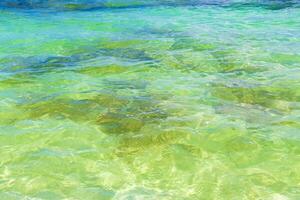 Waves at tropical beach caribbean sea clear turquoise water Mexico. photo