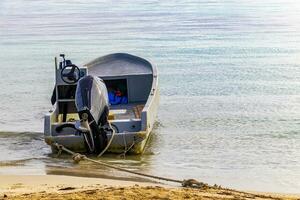 Boats yachts ship catamaran jetty beach Playa del Carmen Mexico. photo