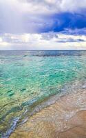 Tropical Caribbean beach clear turquoise water Playa del Carmen Mexico. photo