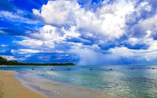 Tropical Caribbean beach clear turquoise water Playa del Carmen Mexico. photo
