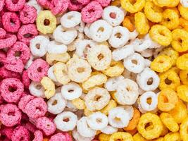 colorful cereal rings on white background. photo